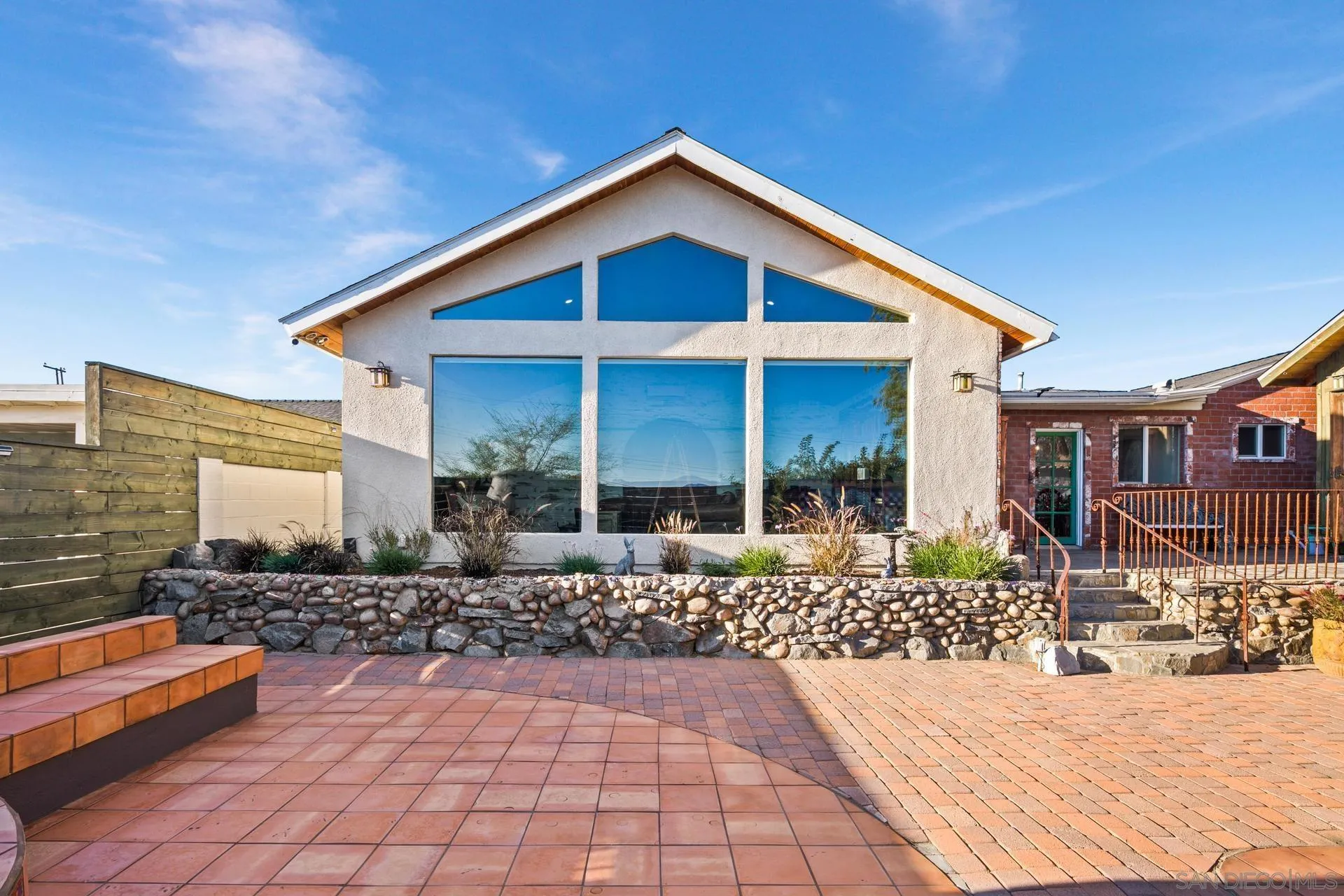 9475 Wharton Road Santee, CA 92071 - Photo 8 of 62 a front view of a house with a yard