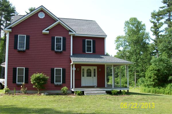 139 Colburn Road Charlton, MA 01507 - Photo 1 of 30 a front view of a house with a yard