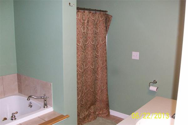 139 Colburn Road Charlton, MA 01507 - Photo 18 of 30 a bathroom with a bathtub and shower