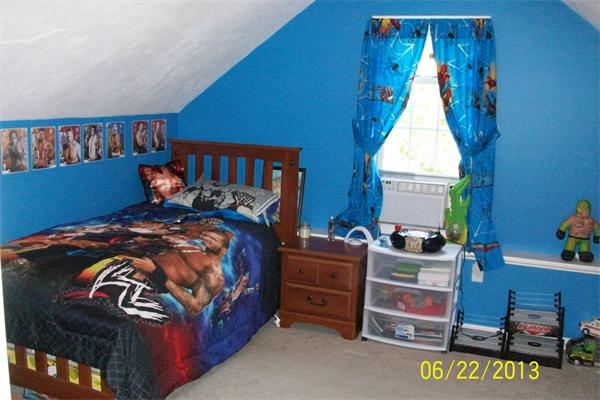139 Colburn Road Charlton, MA 01507 - Photo 22 of 30 a bed sitting in a bedroom next to a window