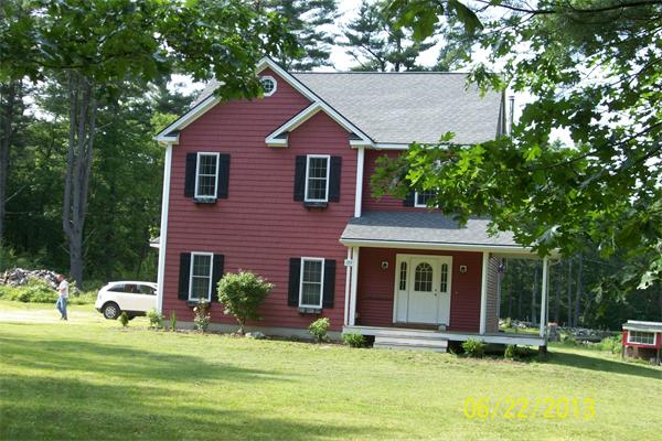 139 Colburn Road Charlton, MA 01507 - Photo 3 of 30 front view of a house with a yard