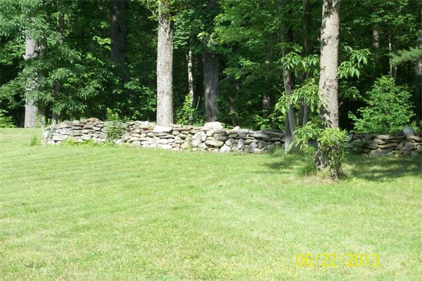 139 Colburn Road Charlton, MA 01507 - Photo 4 of 30 a view of a tree with a yard