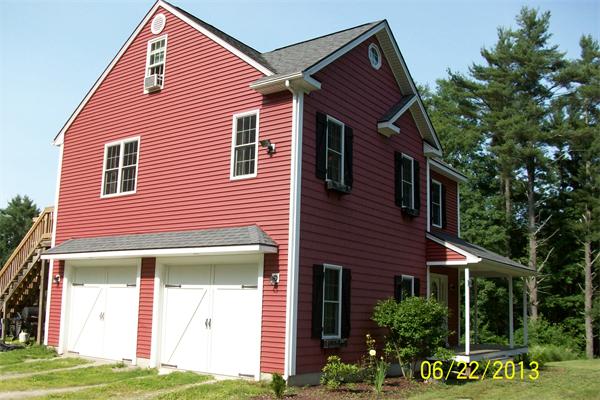 139 Colburn Road Charlton, MA 01507 - Photo 5 of 30 a front view of a house with a yard