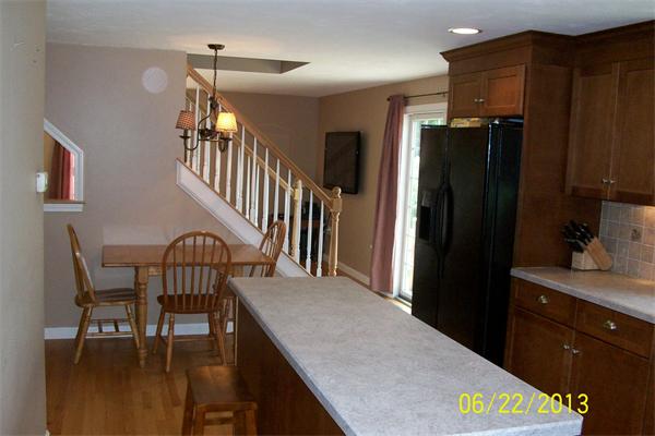 139 Colburn Road Charlton, MA 01507 - Photo 7 of 30 a view of a hallway with furniture
