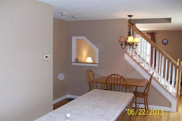 139 Colburn Road Charlton, MA 01507 - Photo 9 of 30 a balcony with table and chairs
