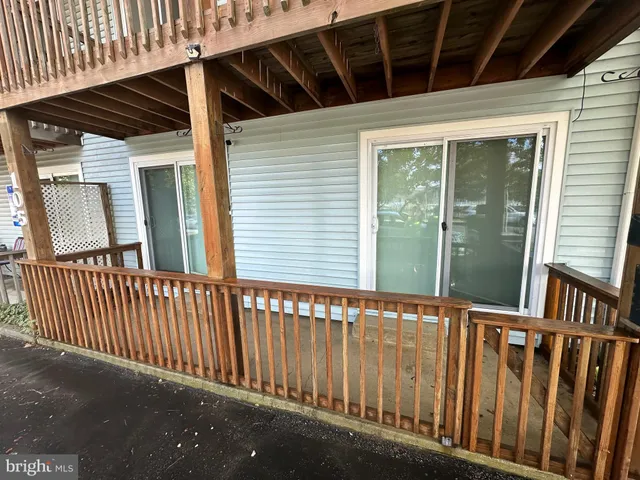 a view of a balcony with a small cabin