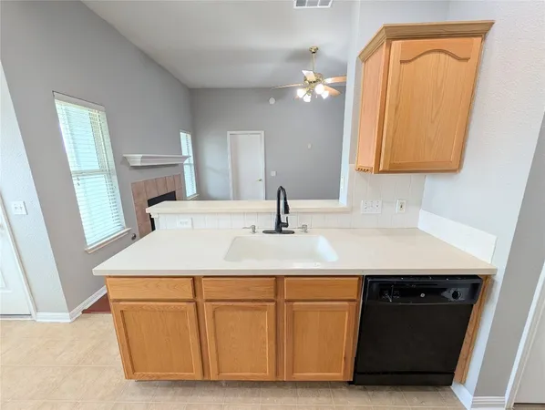 a bathroom with a sink vanity and a mirror