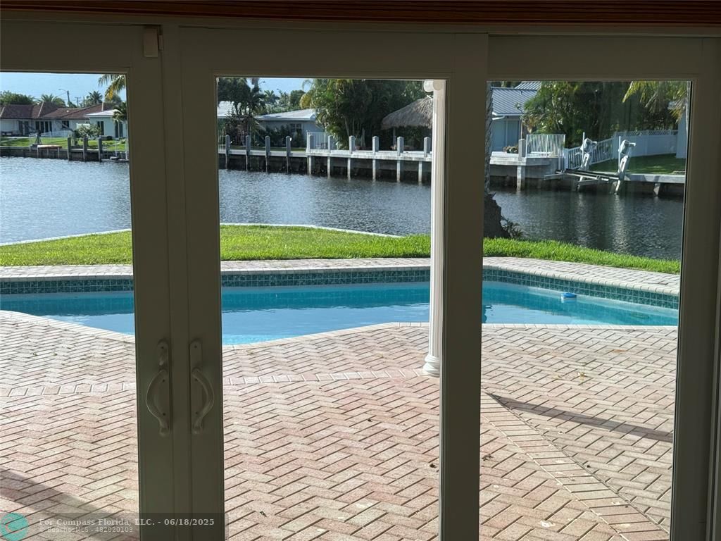 5251 Northeast 29th Avenue Fort Lauderdale, FL 33308 - Photo 2 of 6 a view of swimming pool with outdoor seating