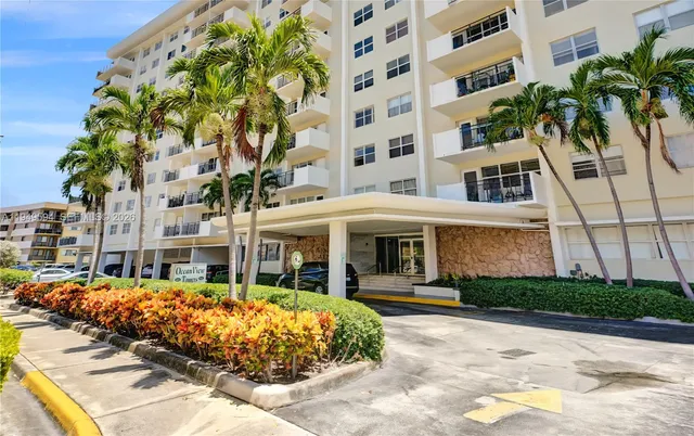 a view of a kitchen with a large window