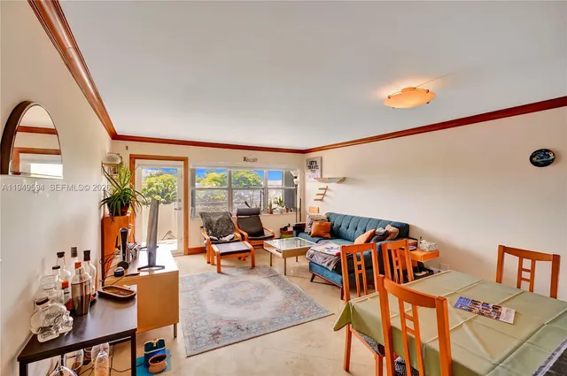a view of swimming pool with outdoor seating and lake view