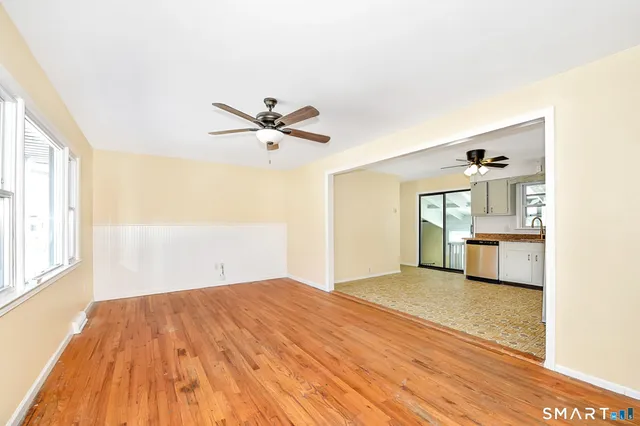 a view of a livingroom with a flat screen tv