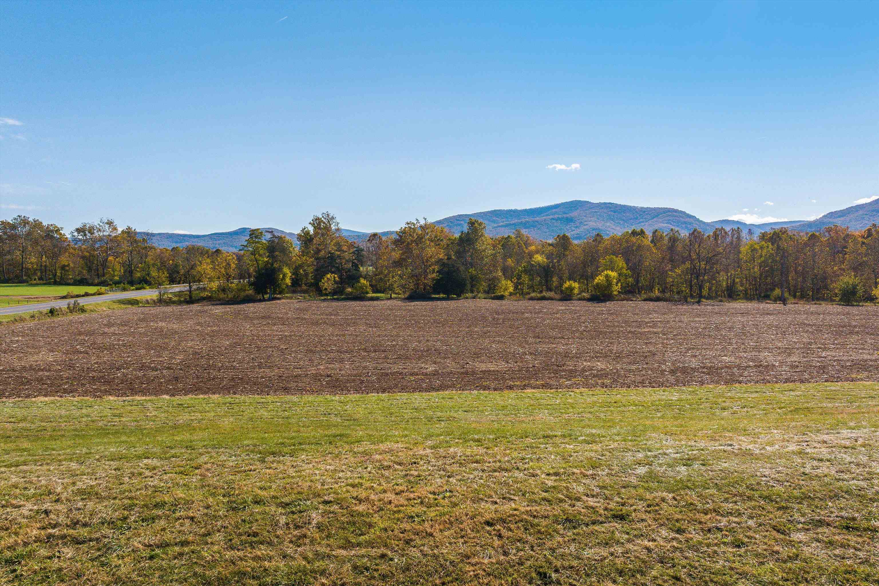 Tbd Lot 4 Tbd Road Elkton, VA 22827 - Photo 17 of 26 a view of a lake with mountains in the background