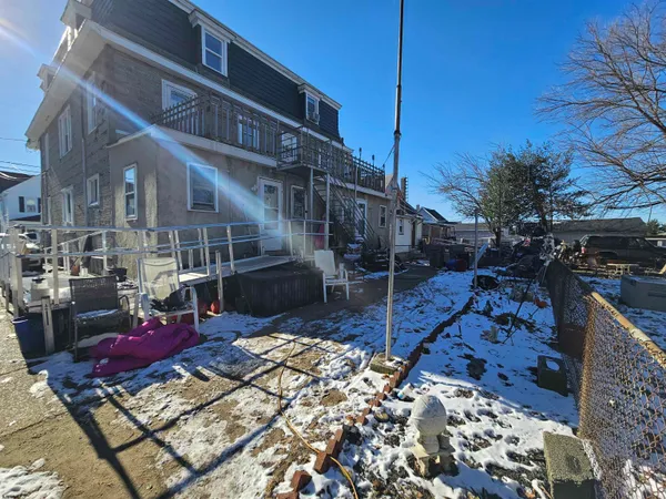 a view of yard with wooden deck