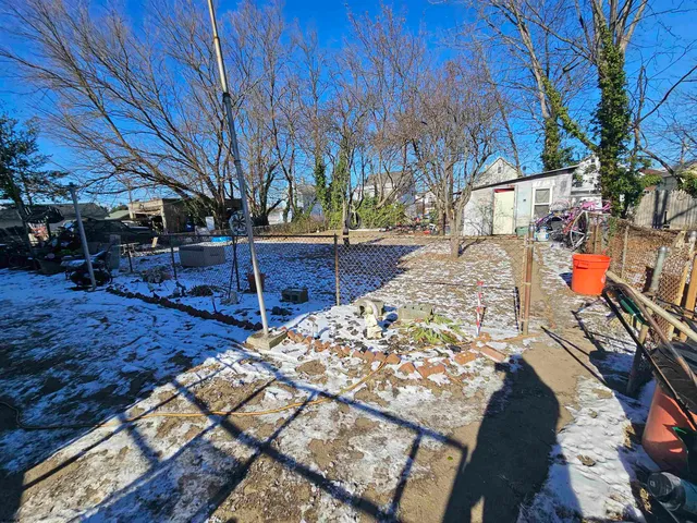 a view of yard with wooden deck