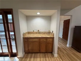 a view of a kitchen from the hallway