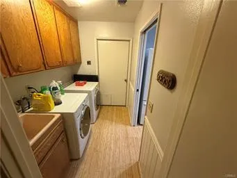 a dining room with furniture and a floor to ceiling window