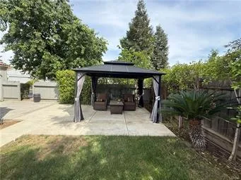 a view of backyard with cabin