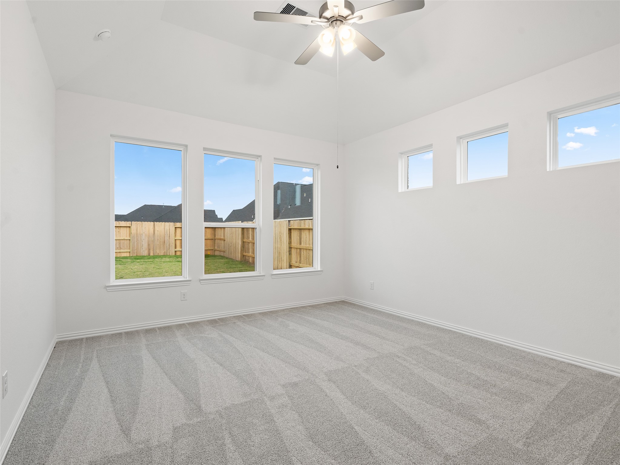 410 Strm Bnd Way Rosenberg, TX 77471 - Photo 18 of 39 a view of an empty room with a window