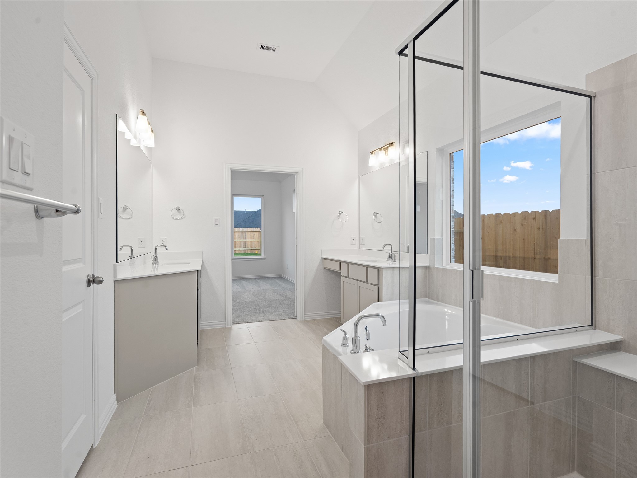 410 Strm Bnd Way Rosenberg, TX 77471 - Photo 22 of 39 a view of a bathroom with a sink and mirror
