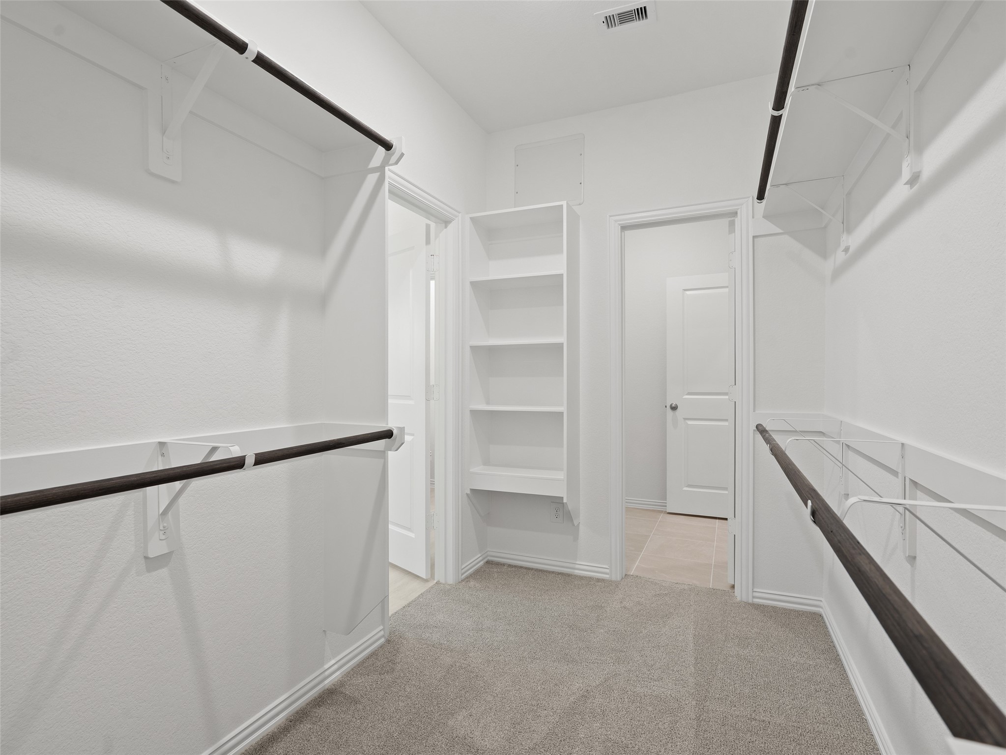 410 Strm Bnd Way Rosenberg, TX 77471 - Photo 23 of 39 a view of an empty walk in closet