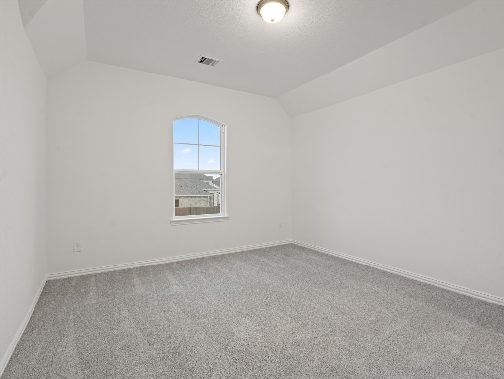 410 Strm Bnd Way Rosenberg, TX 77471 - Photo 33 of 39 an empty room with a window