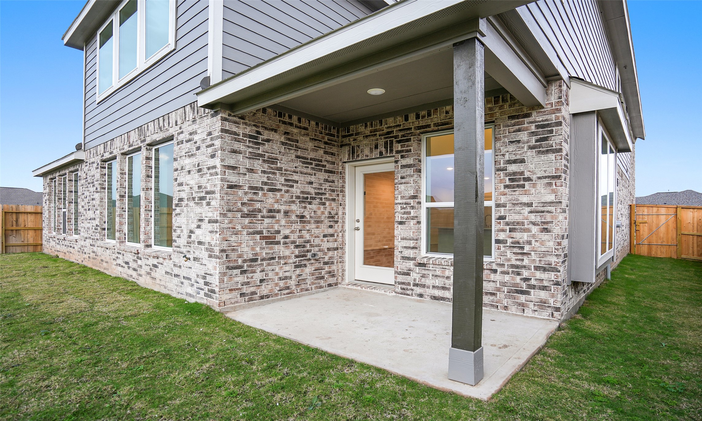 410 Strm Bnd Way Rosenberg, TX 77471 - Photo 35 of 39 a front view of a house with a garden