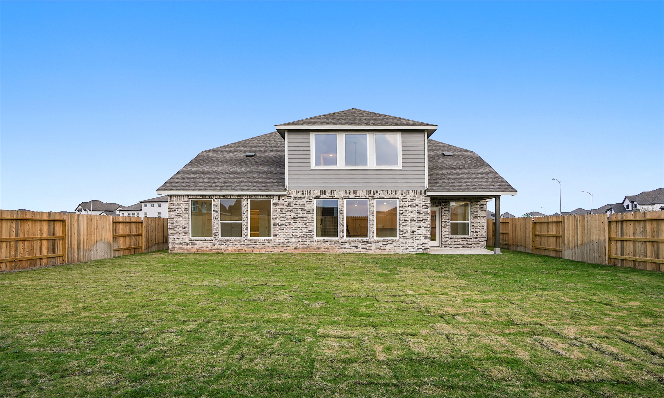 410 Strm Bnd Way Rosenberg, TX 77471 - Photo 37 of 39 a front view of a house with a yard