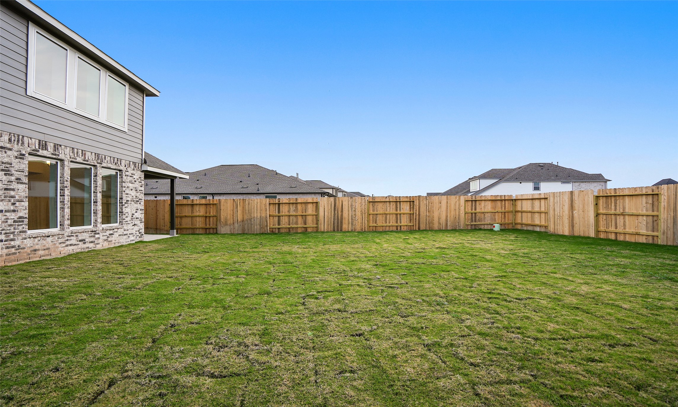 410 Strm Bnd Way Rosenberg, TX 77471 - Photo 38 of 39 a view of a house with backyard and garden