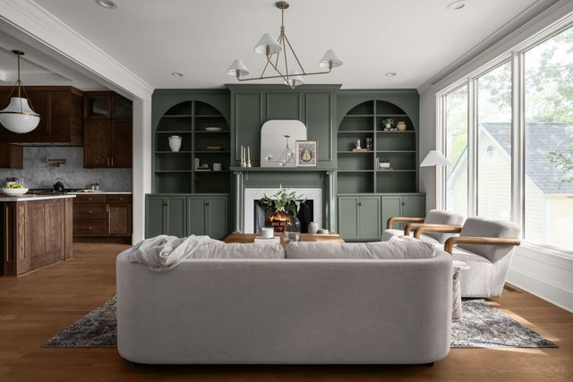 a kitchen with a sink cabinets and window