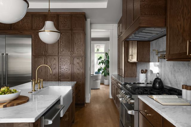 a bedroom with a bed and a fireplace