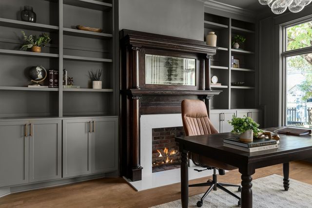 a living room with furniture a window and kitchen view