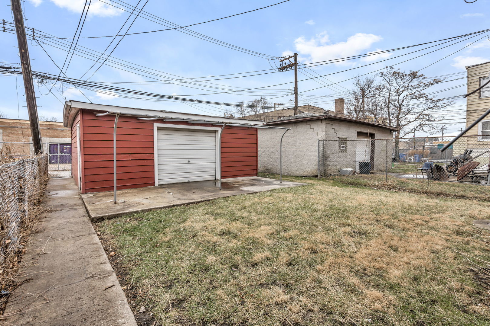 7924 South May Street, Unit 2 Chicago, IL 60620 - Photo 10 of 10 a front view of a house with a yard