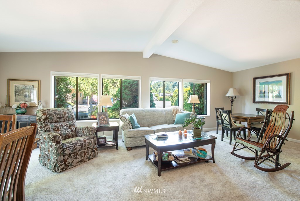 907 240th Place Southwest Bothell, WA 98021 - Photo 6 of 24 a living room with furniture and a large window