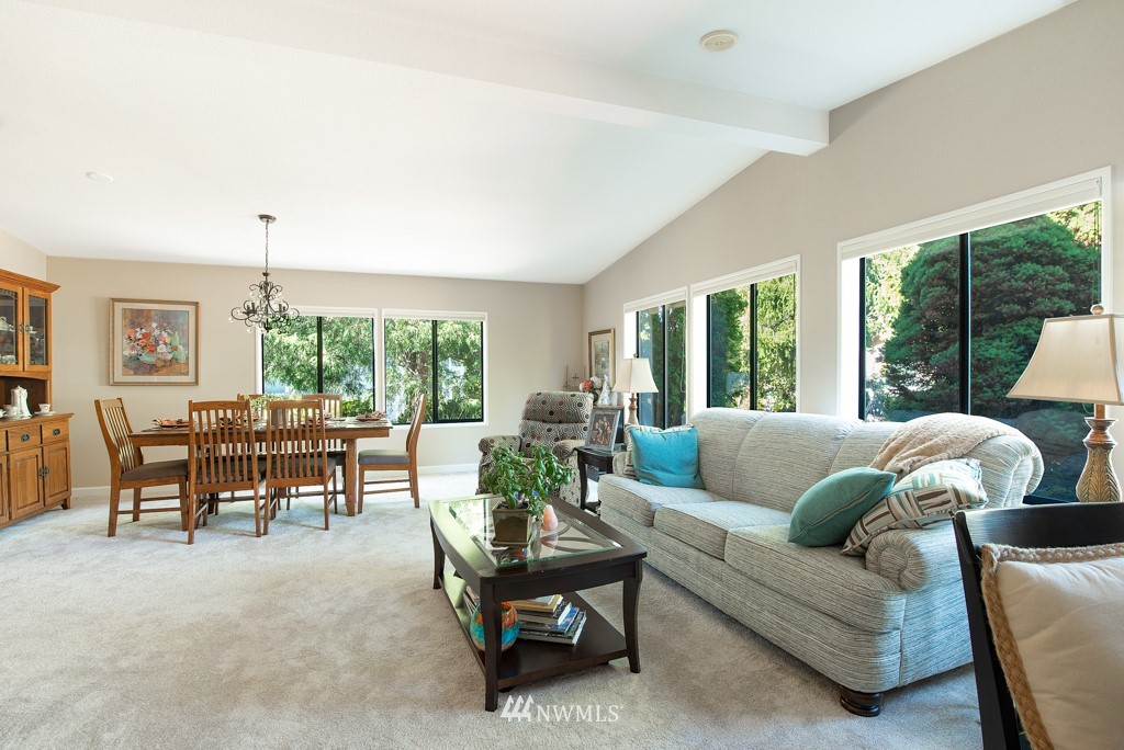 907 240th Place Southwest Bothell, WA 98021 - Photo 10 of 24 a living room with furniture and a large window