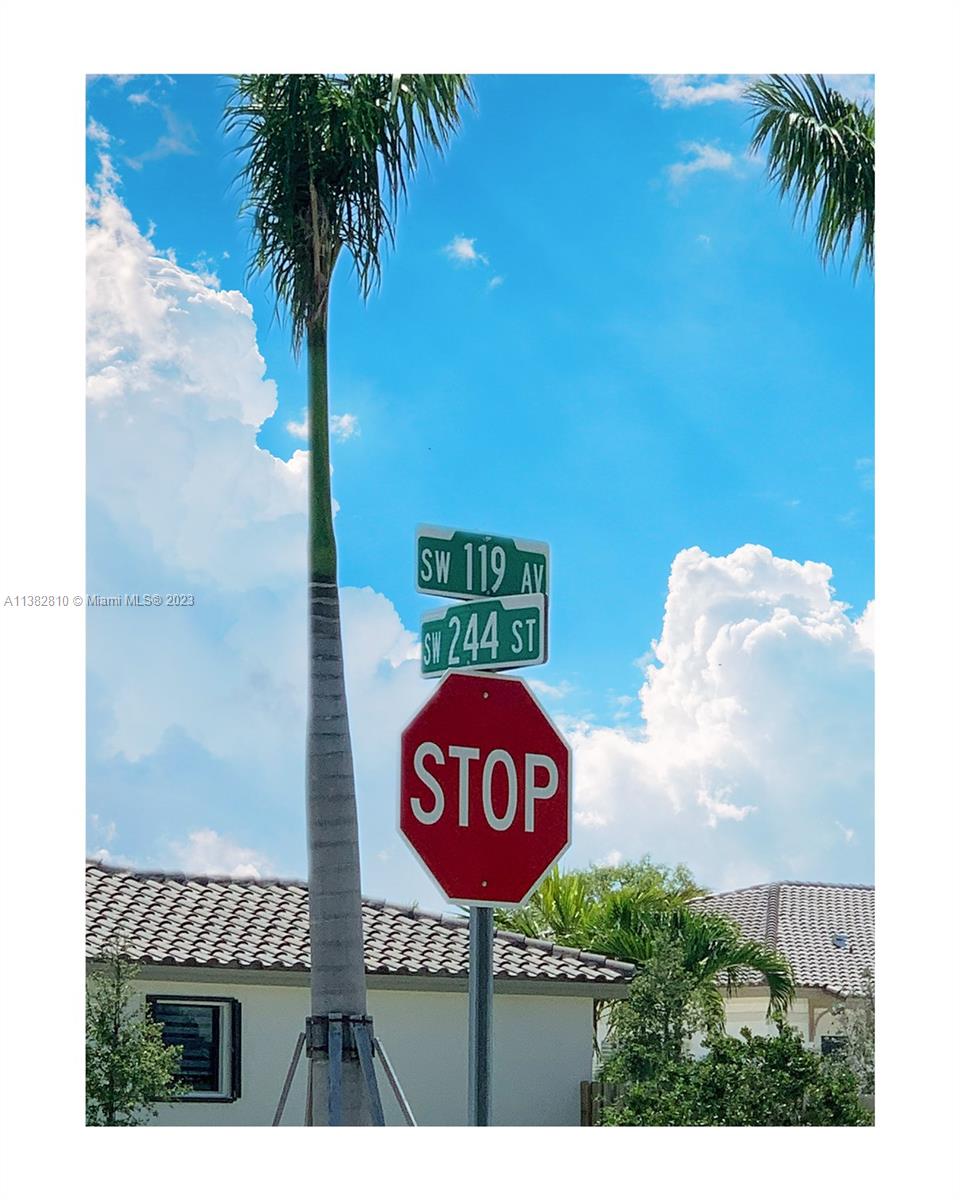 11909 Southwest 244th Street, Unit 11909 Homestead, FL 33032 - Photo 41 of 45 a view of a sign of a park