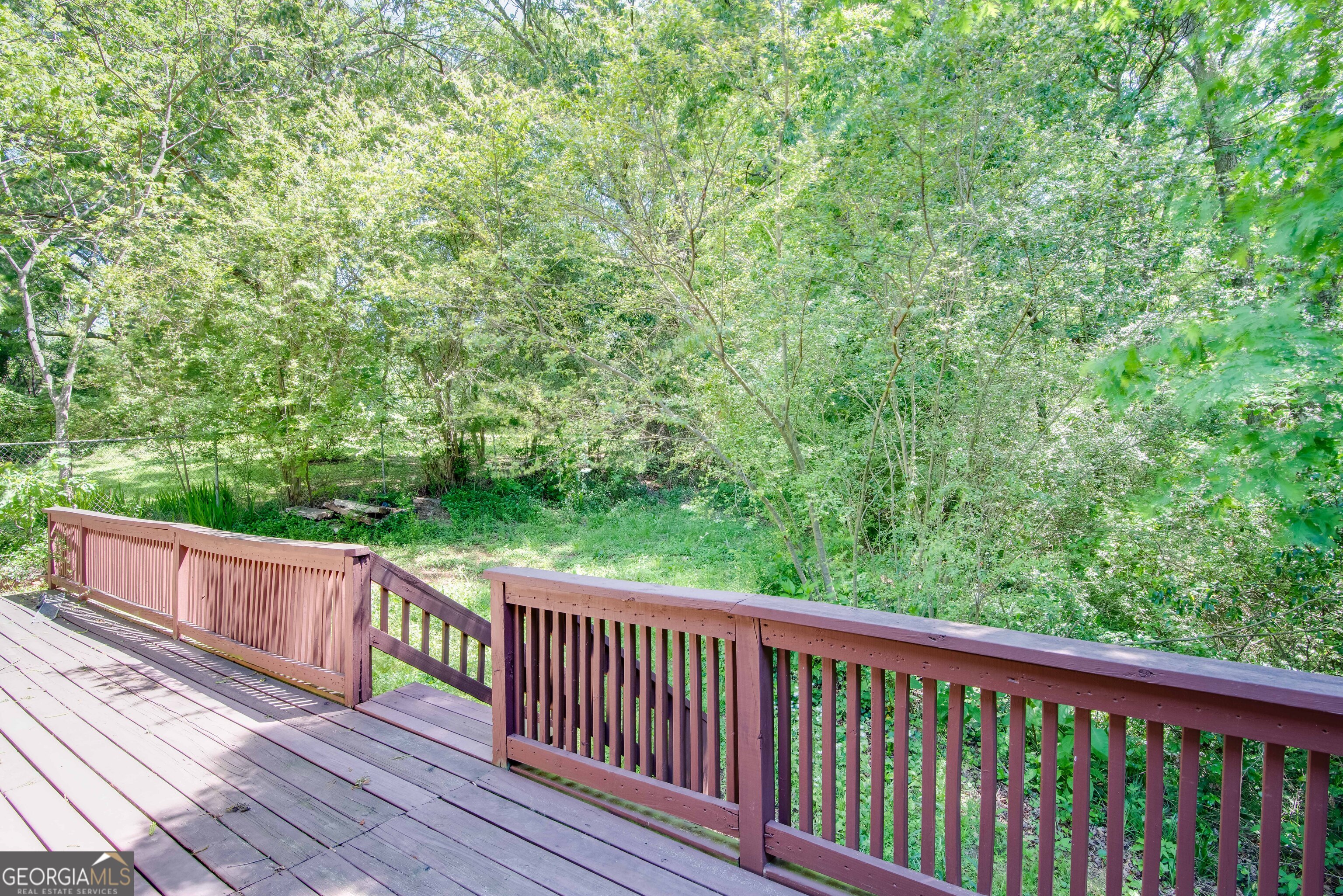 2982 Pearl Street Atlanta, GA 30344 - Photo 11 of 11 a view of a balcony with wooden floor