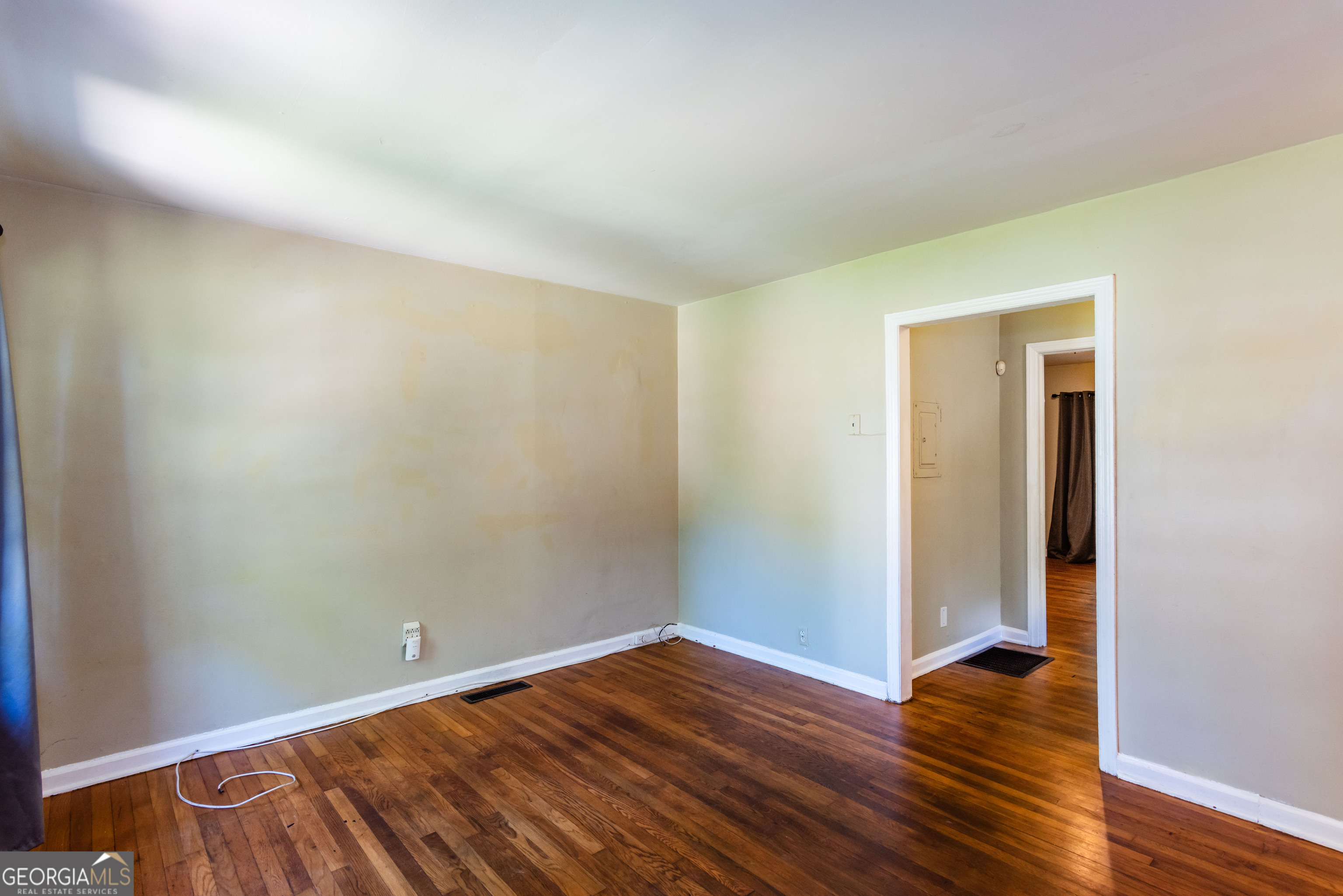 2982 Pearl Street Atlanta, GA 30344 - Photo 2 of 11 a view of a room with wooden floor