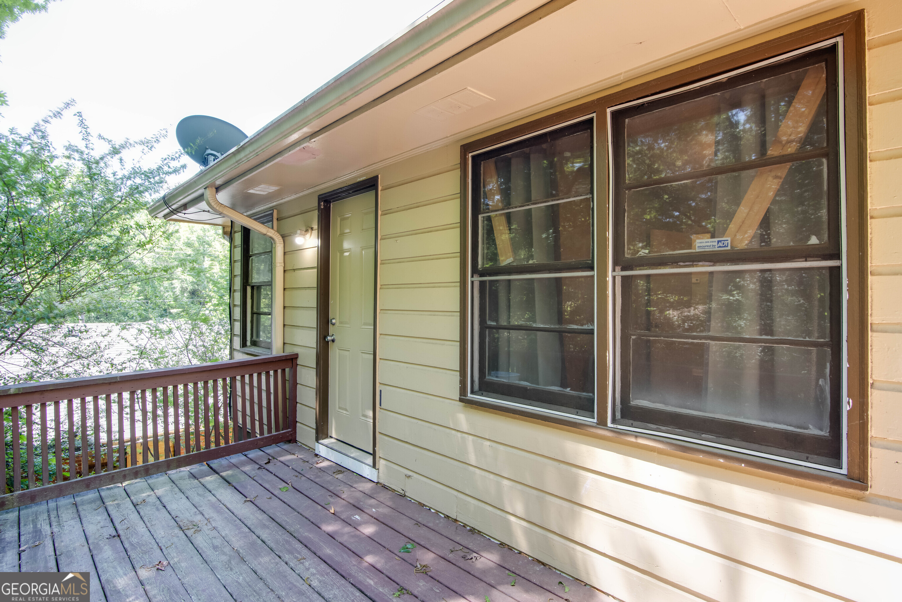 2982 Pearl Street Atlanta, GA 30344 - Photo 10 of 11 a view of a brick house with a large window