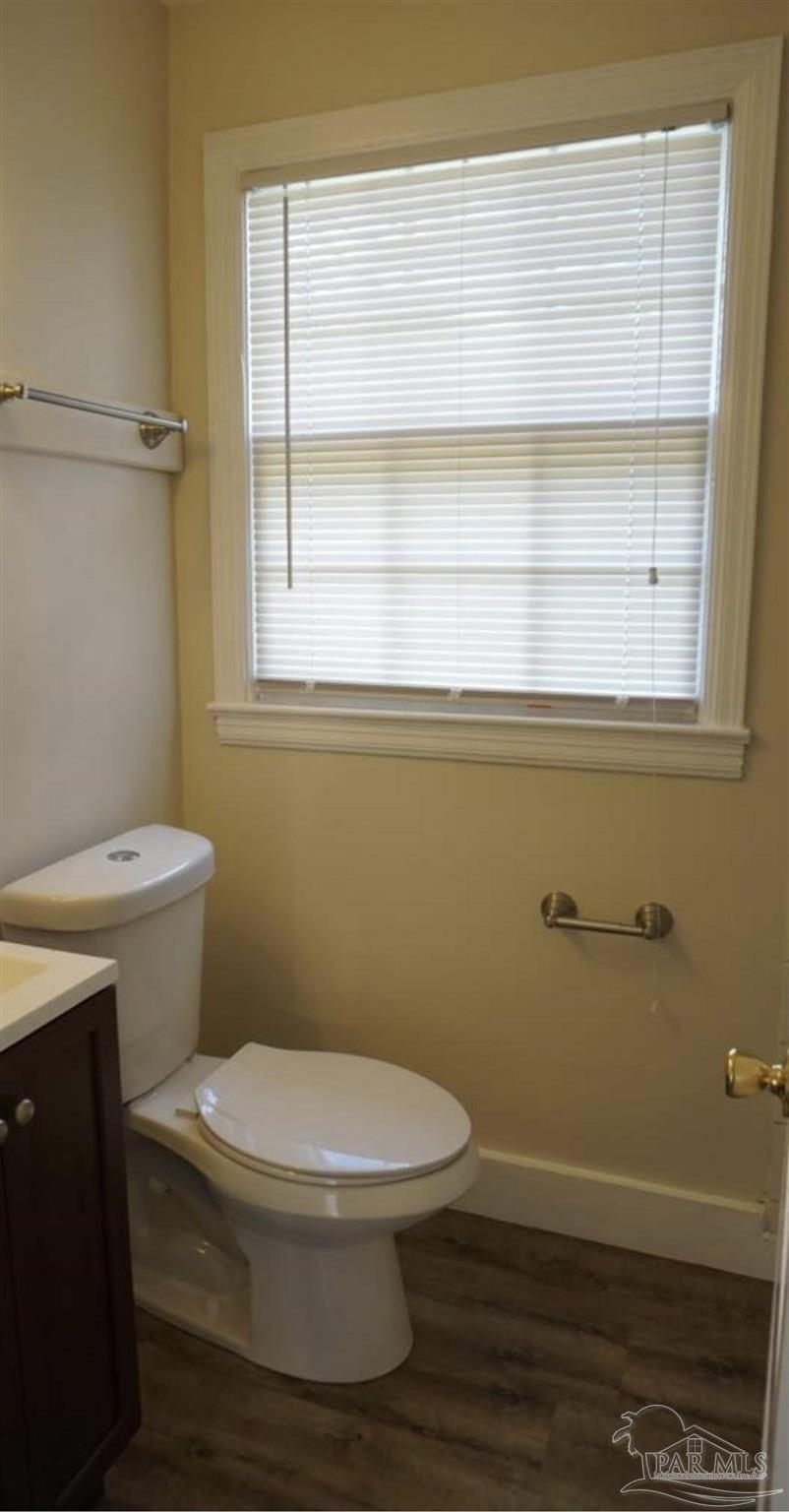 102 Morris Avenue Cantonment, FL 32533 - Photo 9 of 12 a bathroom with a toilet and a sink