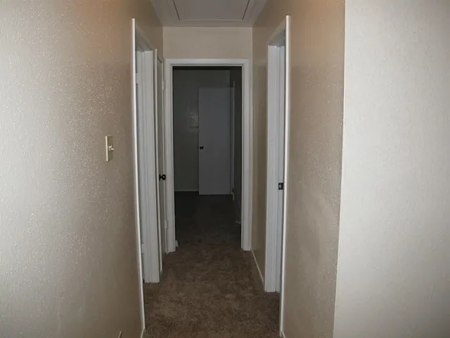 a view of a hallway with a hallway