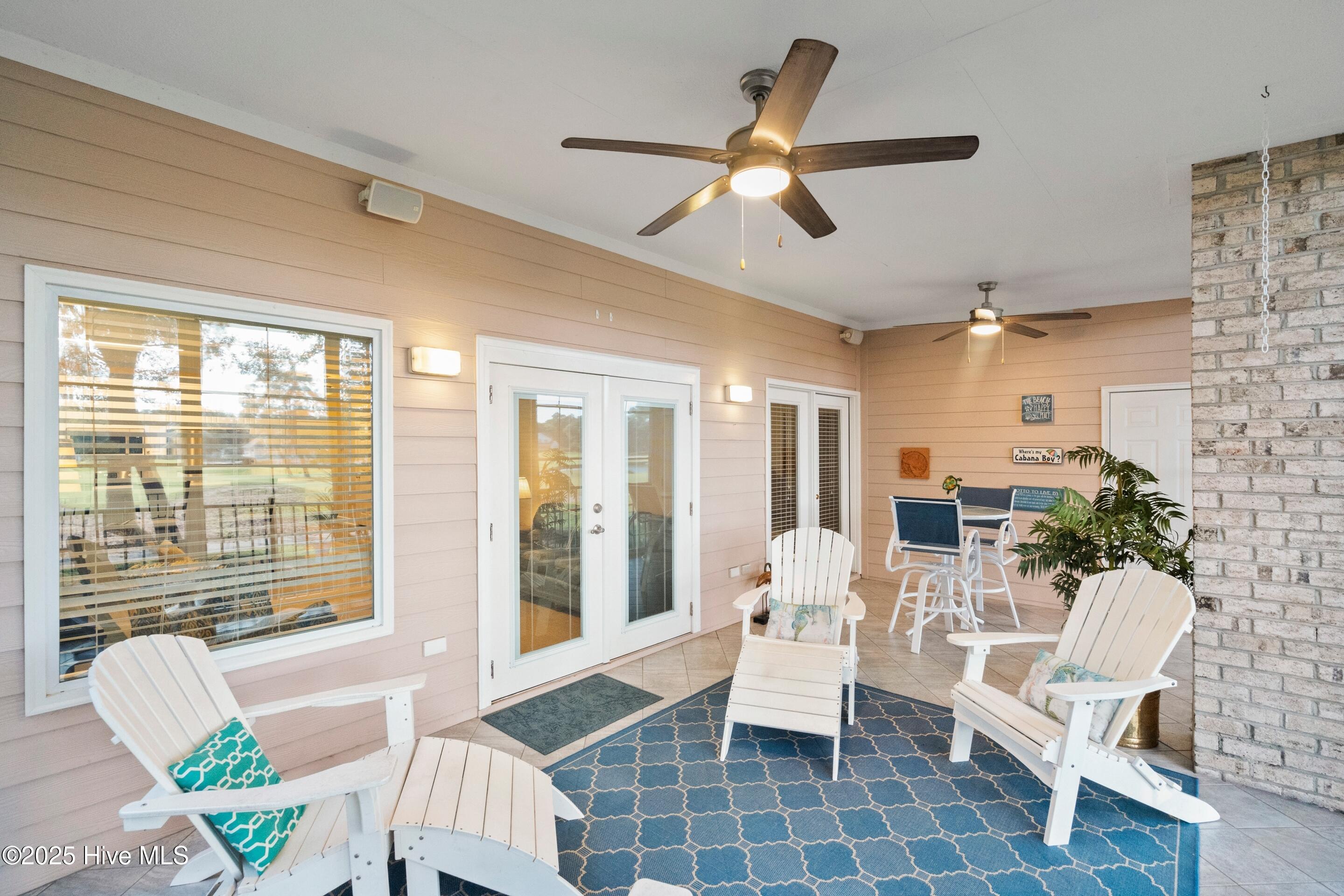 180 Clubhouse Road, Unit 2 Sunset Beach, NC 28468 - Photo 34 of 49 Sunroom 1A