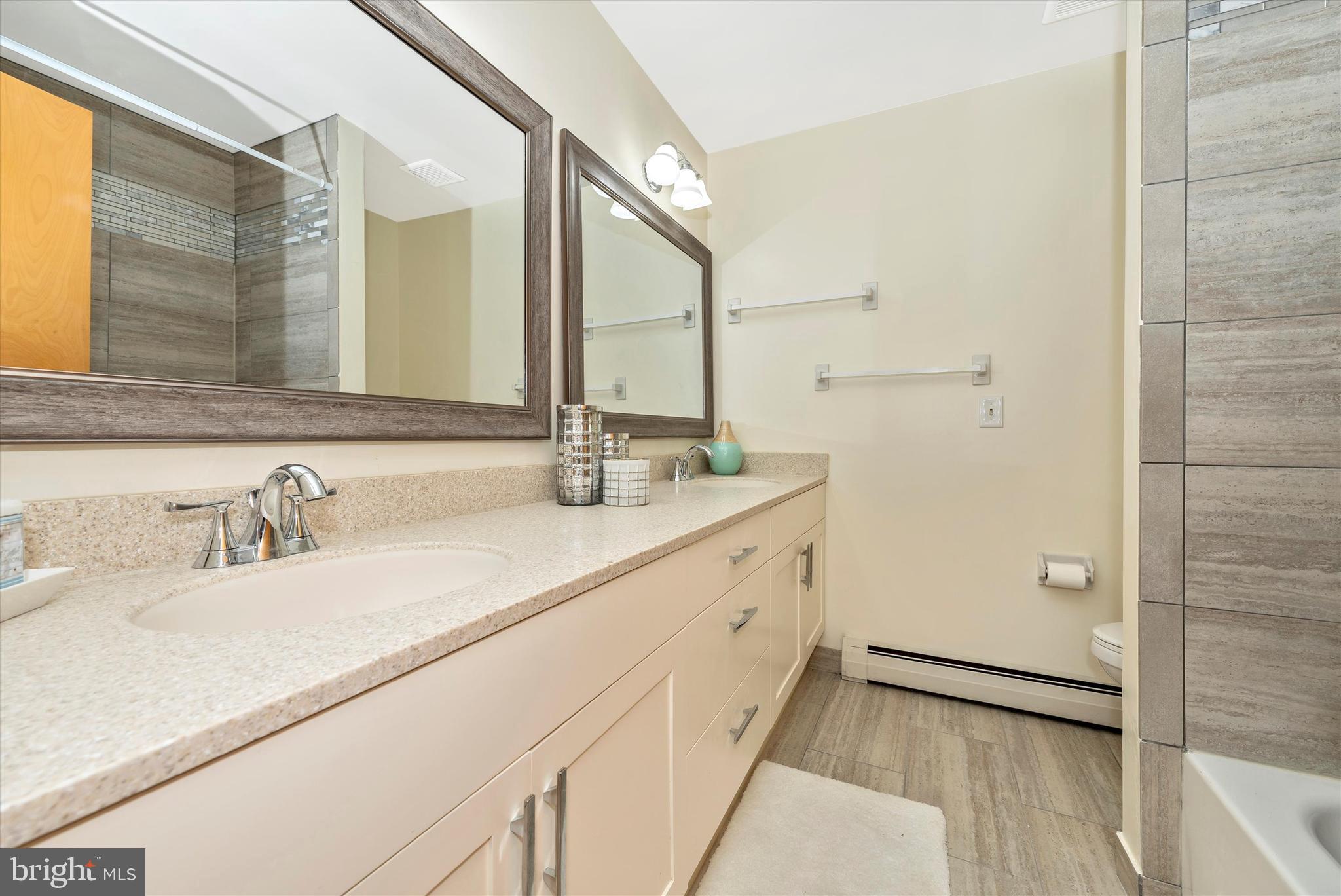 16412 Old Frederick Road Mount Airy, MD 21771 - Photo 23 of 46 Gorgeous quartz counters & custom tile work!