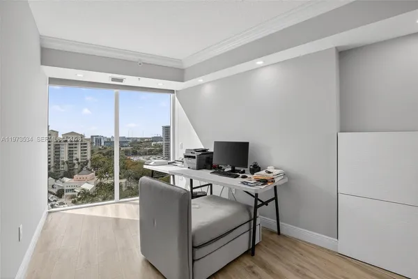 a view of a city from a room