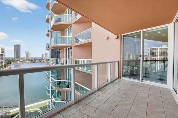 a view of balcony with a potted plant