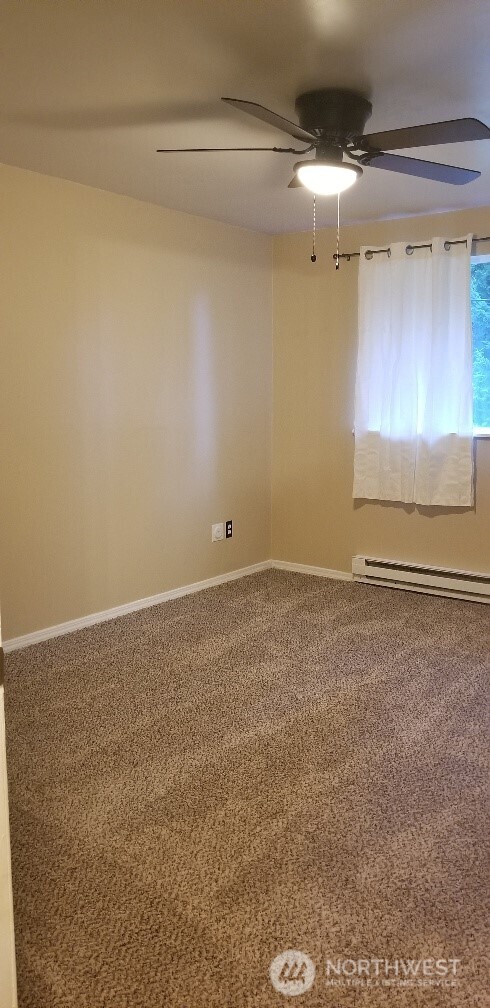 9210-9212 204th Street East Graham, WA 98338 - Photo 11 of 16 a view of an empty room