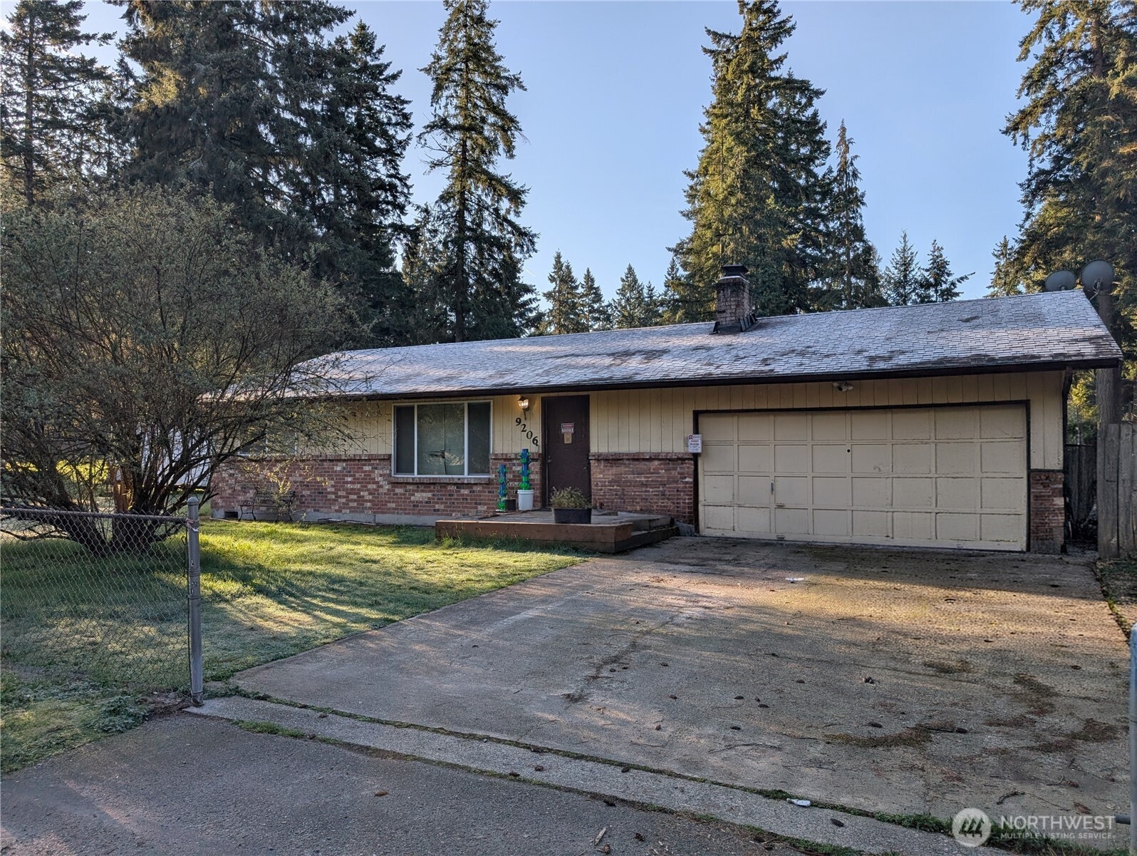9210-9212 204th Street East Graham, WA 98338 - Photo 2 of 16 a view of a house with pool in front of it