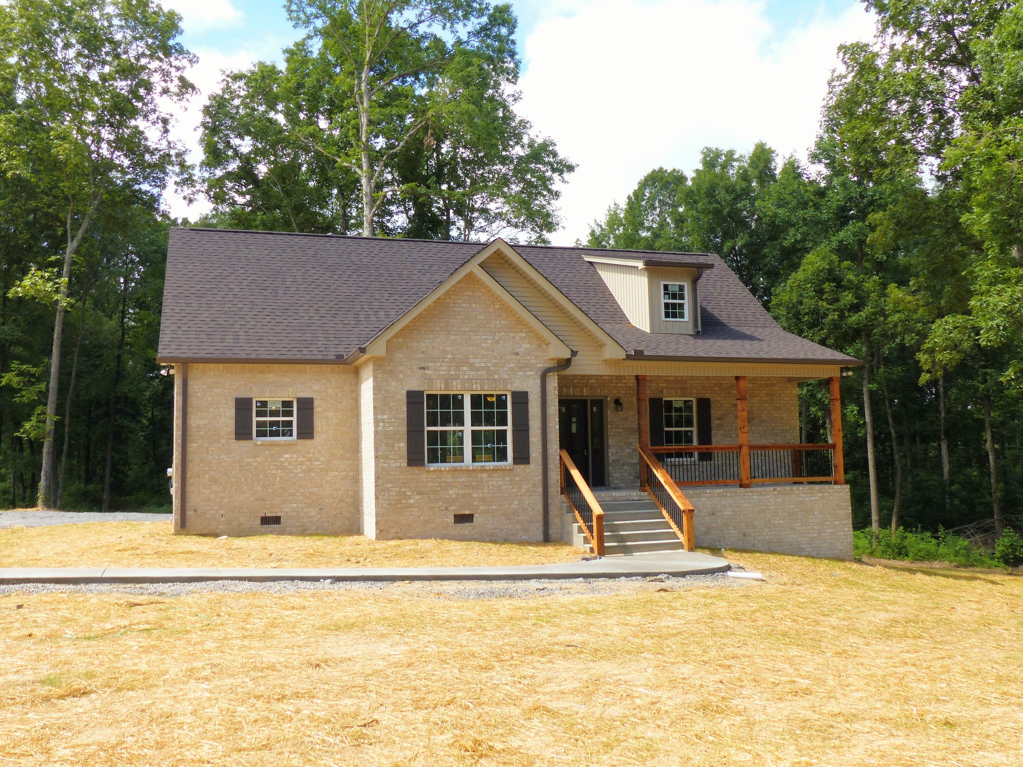 2955 Friendship Road Cross Plains, TN 37049 - Photo 1 of 12 a front view of house with yard and trees around