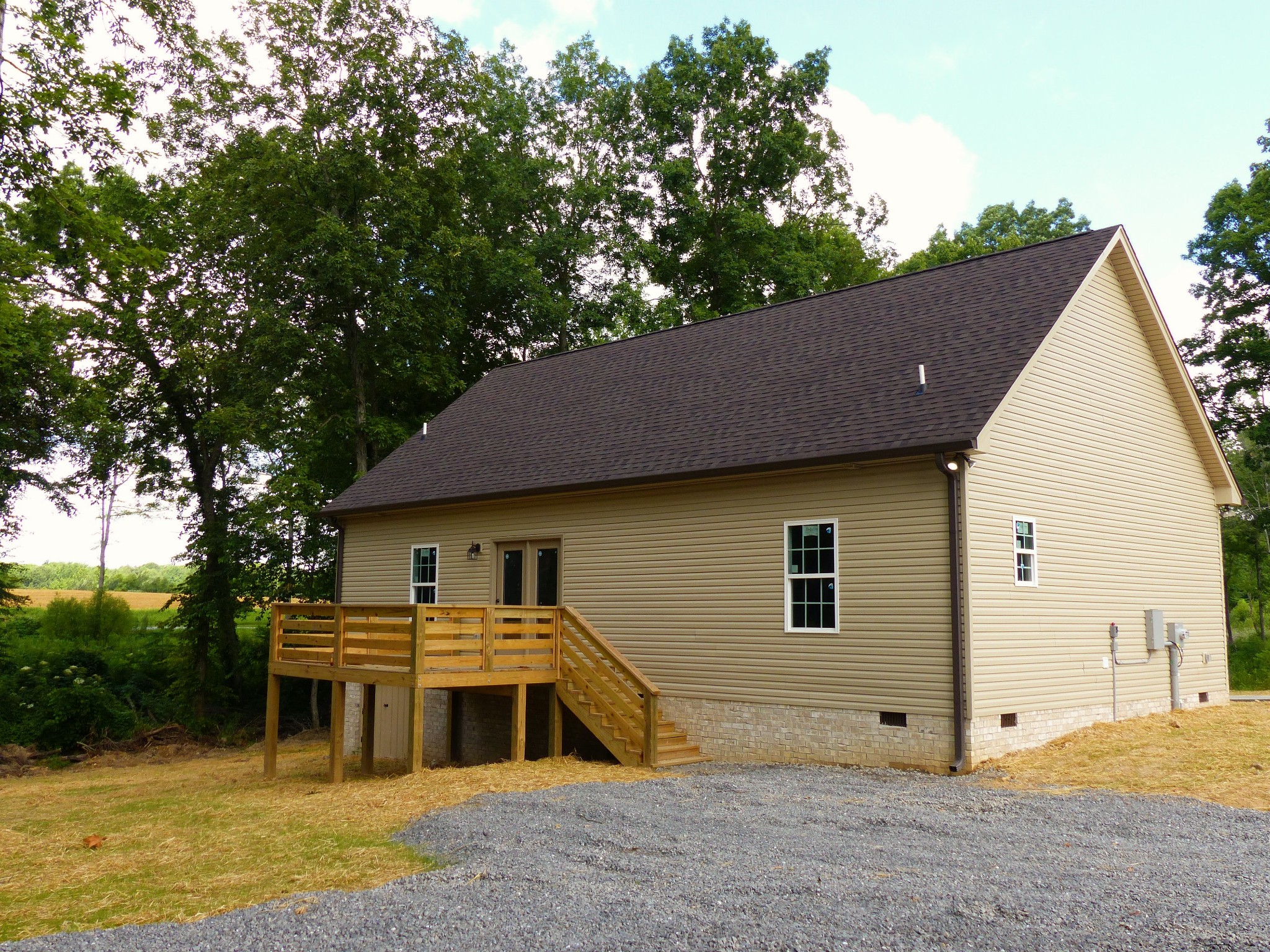 2955 Friendship Road Cross Plains, TN 37049 - Photo 12 of 12 a front view of a house with a yard