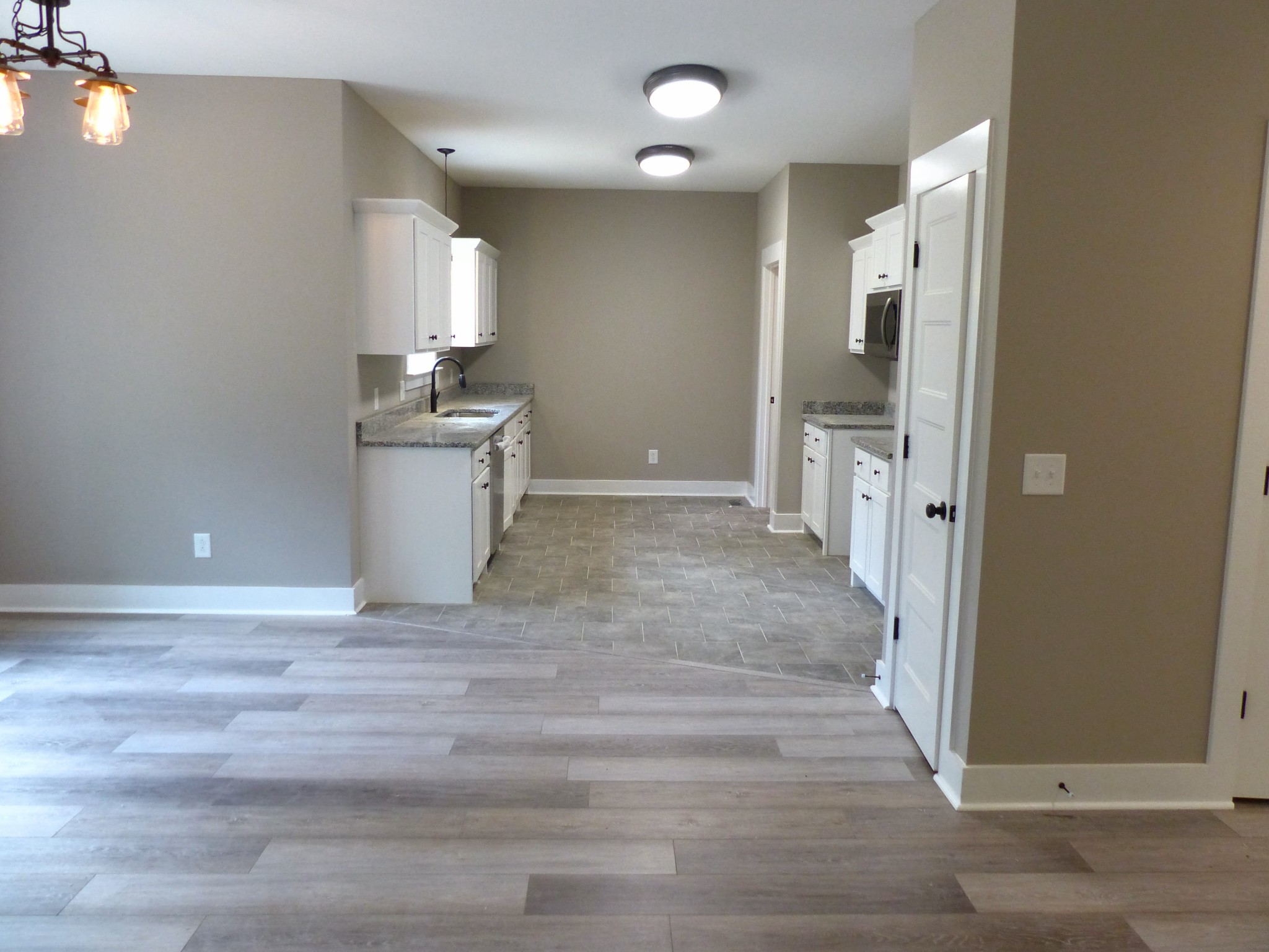 2955 Friendship Road Cross Plains, TN 37049 - Photo 4 of 12 a view of a kitchen and an empty room