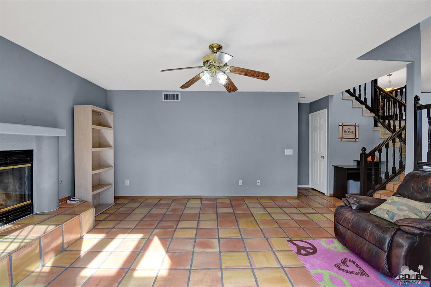 68889 Risueno Road Cathedral City, CA 92234 - Photo 12 of 29 a living room with a couch